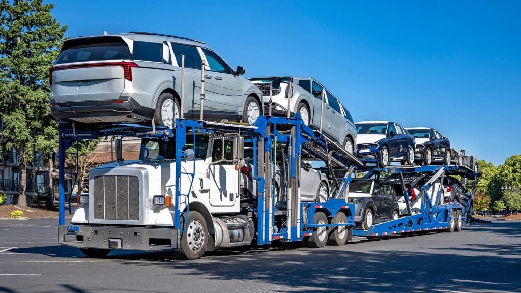 open trailer with multiple cars loaded